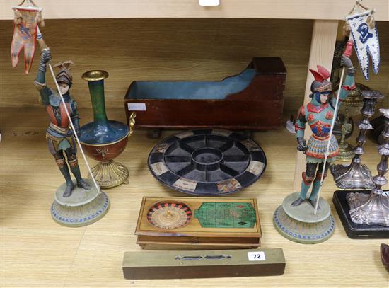 A 19th century dolls cot, a table game, a pair of figures, a spirit level, an Oriental style vase and a Pope John table game tallest 5